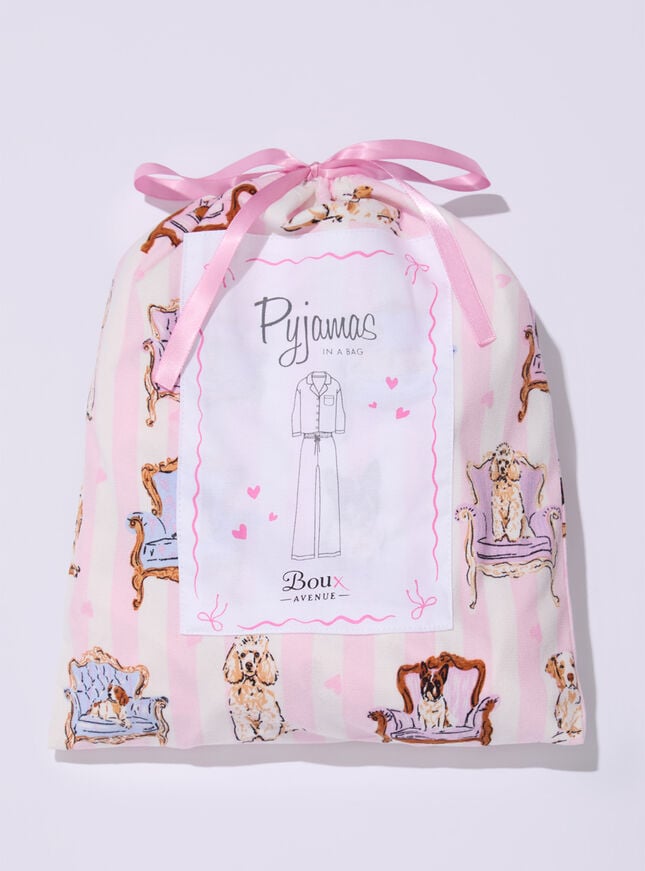 Dogs on chairs fleece pyjamas in a bag