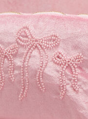 Beaded bow makeup bag