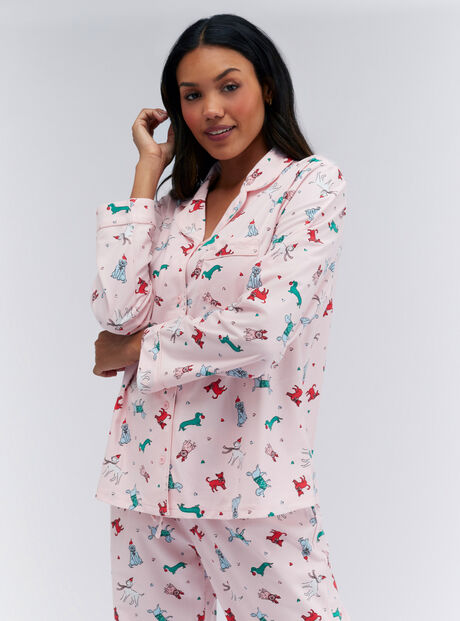 Multicoloured dog pyjamas in a bag