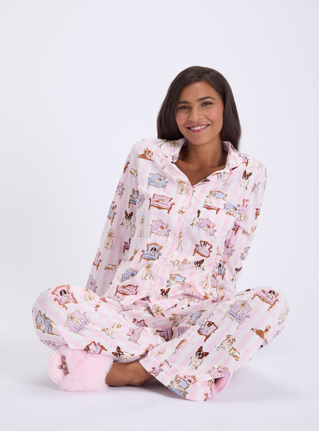 Dogs on chairs fleece pyjamas in a bag