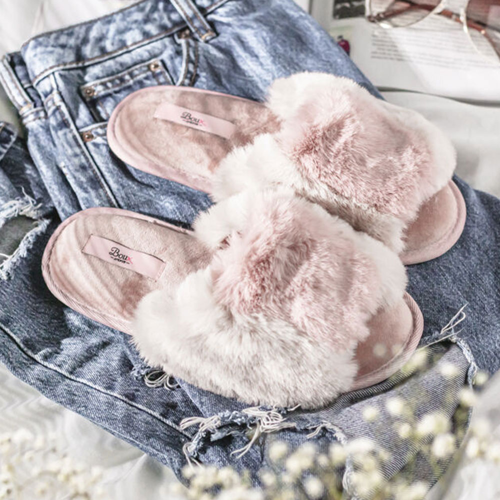 A photograph of pink two tone slippers