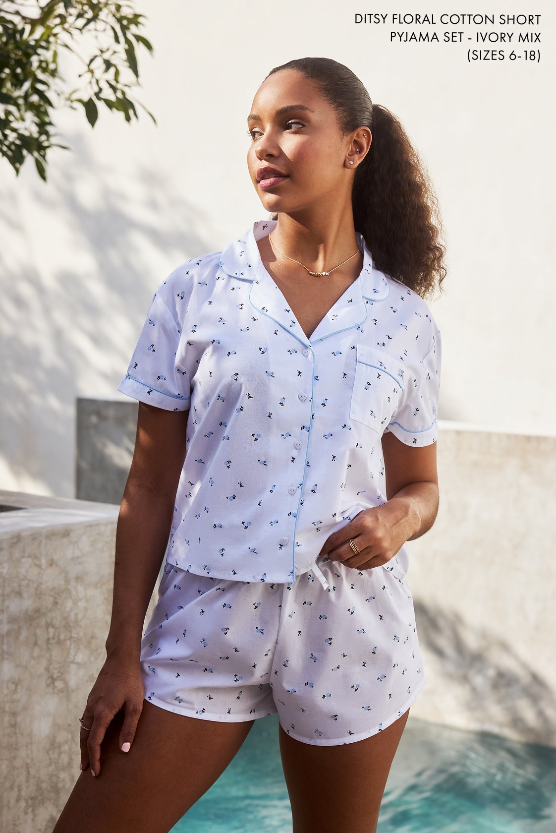 Woman in White and Blue Short Pyjama Set